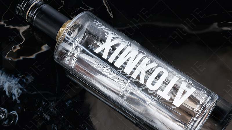 Custom vs Standard Glass Bottles-printing logo Benutzerdefiniertes vs. Standard-Glasflaschen-Drucklogo