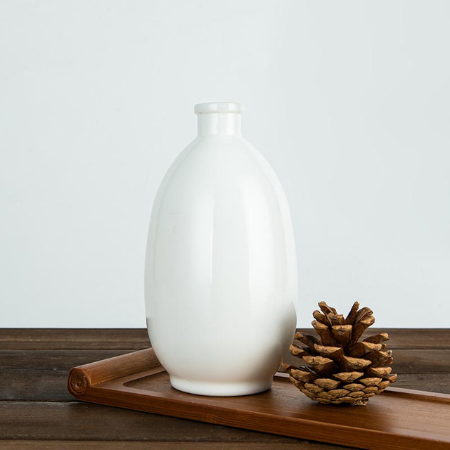 Runde Spirituosenflasche aus Opalglas, 50 cl