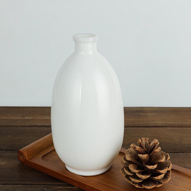 Runde Spirituosenflasche aus Opalglas, 50 cl