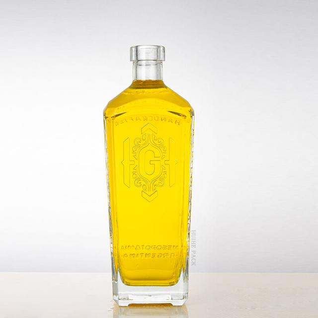 'G'-embossed abgewinkelte Kanten rechteckige Glasfl&uuml;ssigkeitsflasche