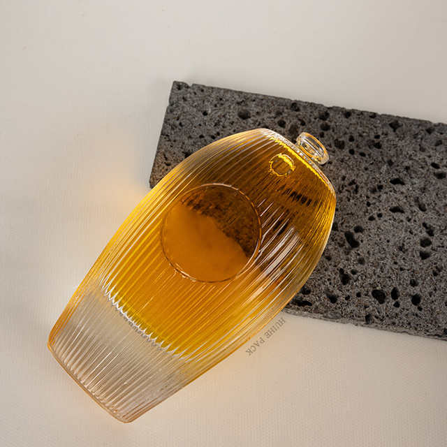 Ovale vertikal gestreifte Muster Glaslippenflasche