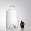 Eingezogener unten abgerundeter kurzer Zylinder Rumflasche mit Designkorken