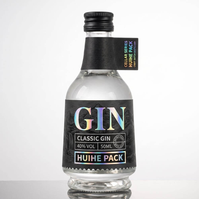 Kleine 50-ml-Alkoholfl&auml;schchen aus klarem Milchglas mit Schraubverschluss